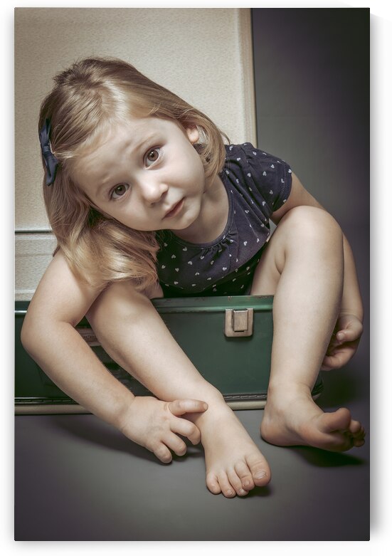 portrait of girl inside an old suitcase by Gualtiero Boffi