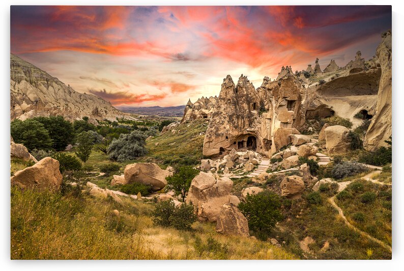 houses carved into the rock in Zelve.  by Gualtiero Boffi