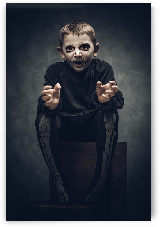 child dressed and made up as a skeleton  by Gualtiero Boffi
