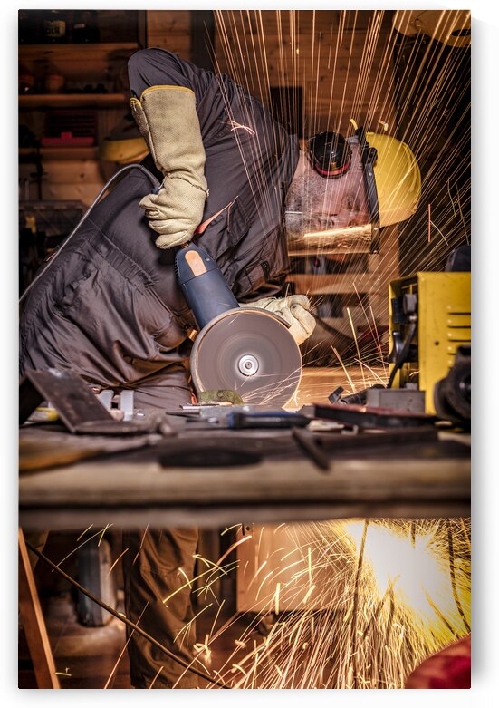 man with grinder in action by Gualtiero Boffi