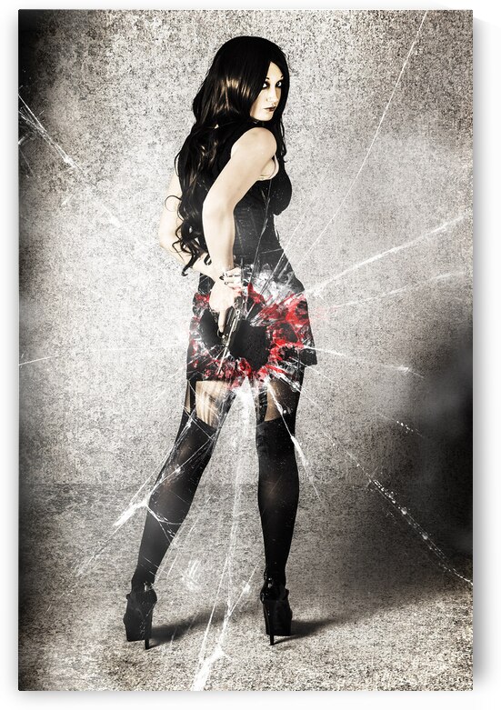 Sexy brunette woman holding gun with deadly style by Jorgo