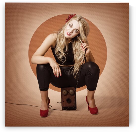 Happy pin up girl talking on retro box telephone by Jorgo
