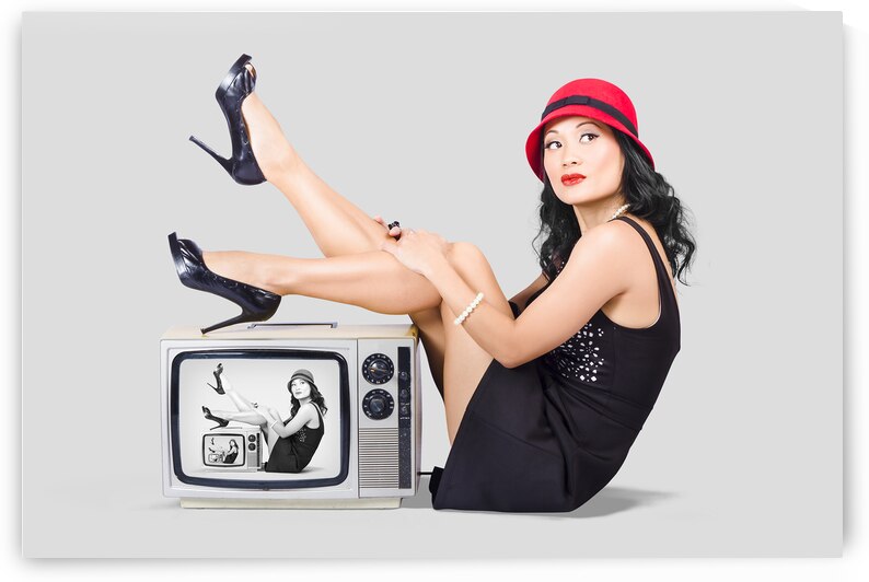 Lovely asian pinup girl posing on vintage tv set by Jorgo