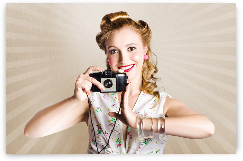 Beautiful Woman Photographer Holding Retro Camera by Jorgo