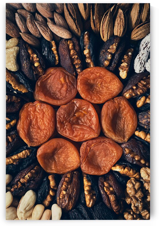A plate of nuts and dried fruits by Kata Endrodi Photography