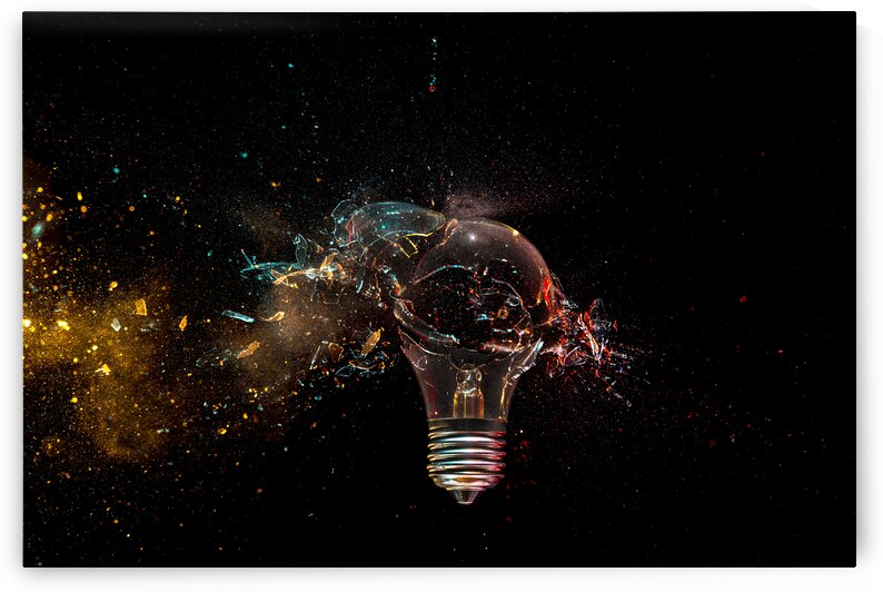 Shattering light bulb on dark background by Gualtiero Boffi
