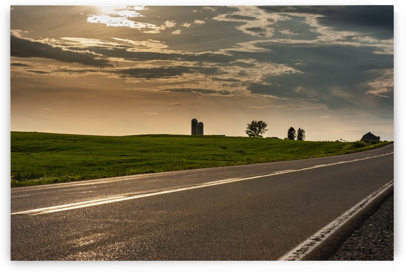 A twilight on the road by Adrien Cote