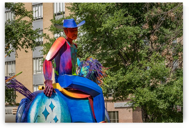 Tracking the end of the rainbow scuplture of cowboy on horse in  by Steve Heap