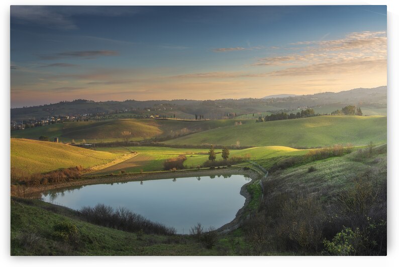 Lake and rolling hills in Tuscany by Stefano Orazzini