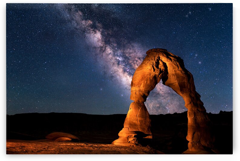 Delicate Arch Below the Solar System by Gary M Slane