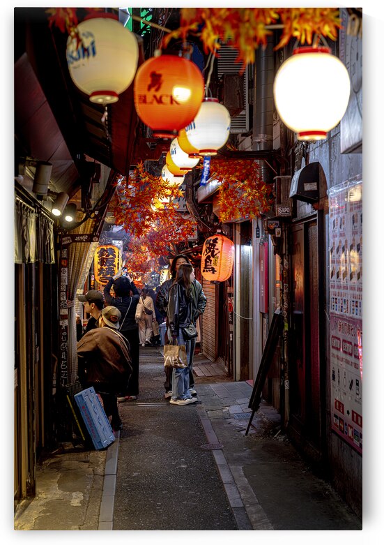 People walking in narrow street decorated with paper lanterns in by Gualtiero Boffi