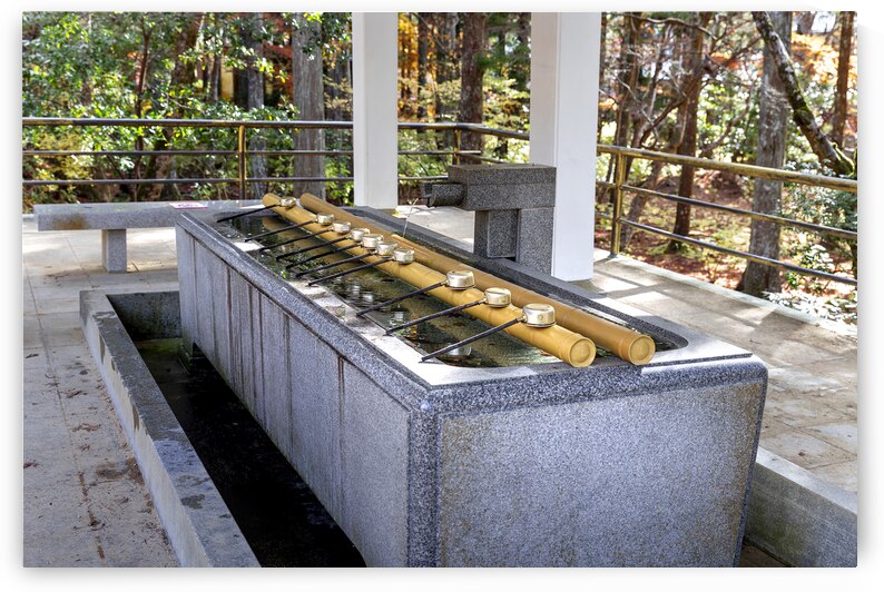 Japanese temizuya fountain providing water for ritual cleansing  by Gualtiero Boffi