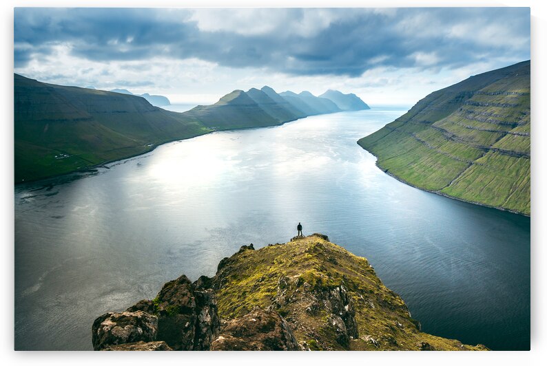 Person at Faroe Islands Fjord by Andreas Wonisch