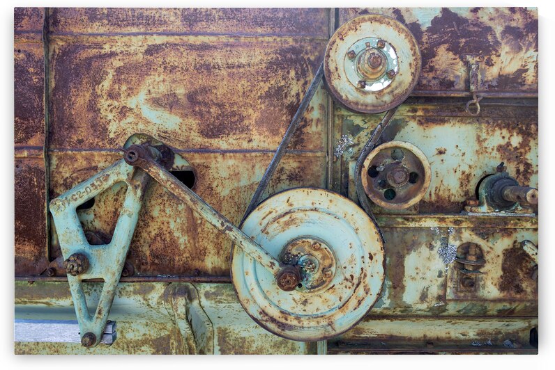 Rusty machine gears pulleys and belt by David Reinhold