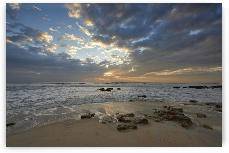 Rocks on a Florida Beach by Images By Jon Evan