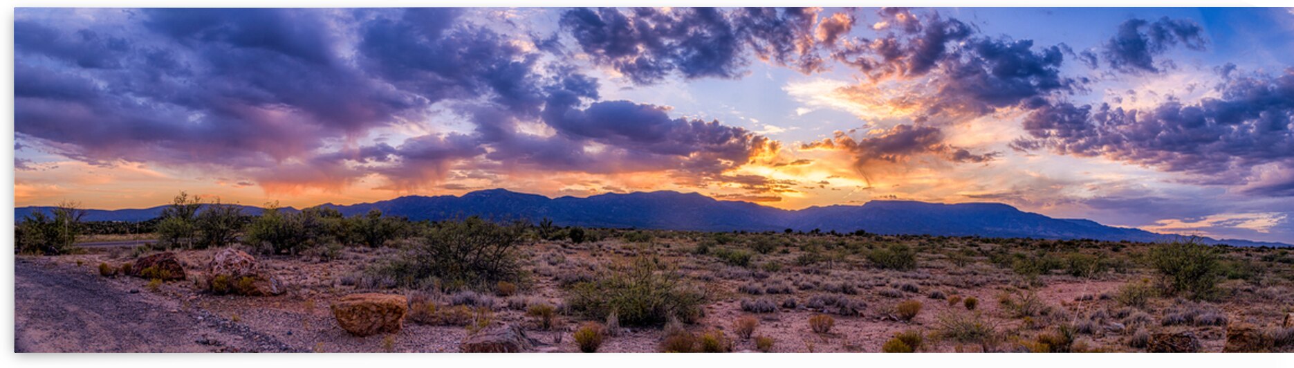 SUNSET TAPESTRY OVER ARID PLAINS by Dream World Images