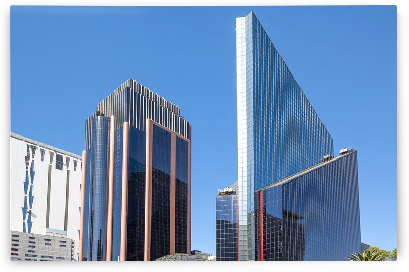 Mexico City Financial Center buildings that host insurance companies banks financial institutions and successful businesses located near Paseo De Reforma and Angel of Independence landmark column by Elijah Lovkoff
