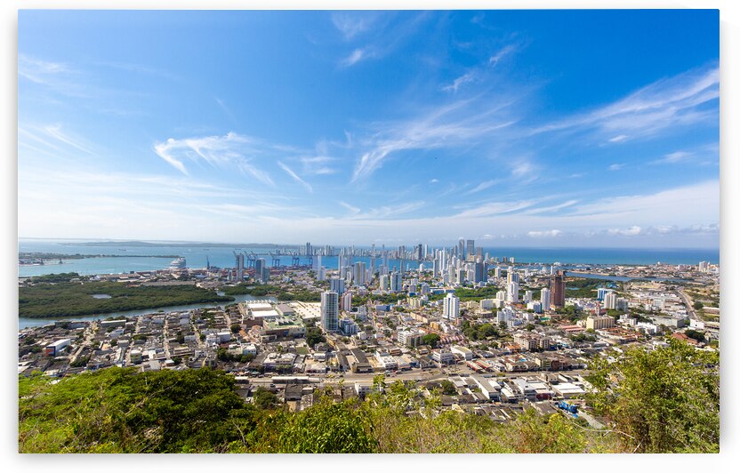 Flag wavering in front of scenic view of Cartagena modern skyline near historic city center and resort hotel zone by Elijah Lovkoff