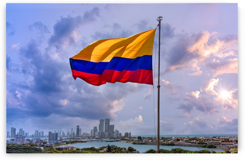 Flag wavering in front of scenic view of Cartagena modern skyline near historic city center and resort hotel zone by Elijah Lovkoff