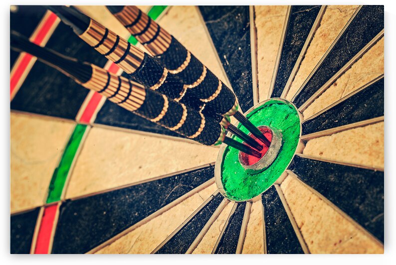 Three darts in bulls eye close up by Dmitry Rukhlenko