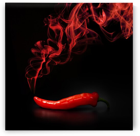Hot smoking chili pepper by DELPHIMAGES