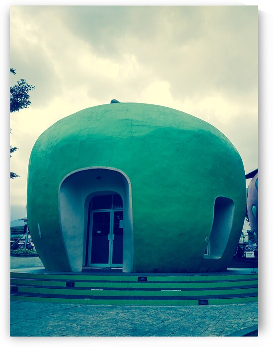 Unique Green Dome-Shaped Building with Arched Entrances by urbancamshot