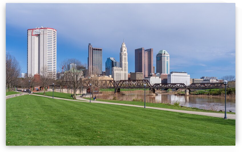 Columbus Ohio waterfront skyline behind railroad truss bridge by Steve Heap