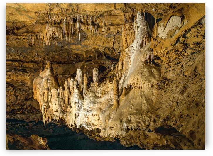 Geologic formations of stalactites and stalagmites in Texas cave by Steve Heap