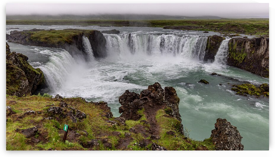 Godafoss waterfall plunging into turquoise water in iceland unde by Gualtiero Boffi