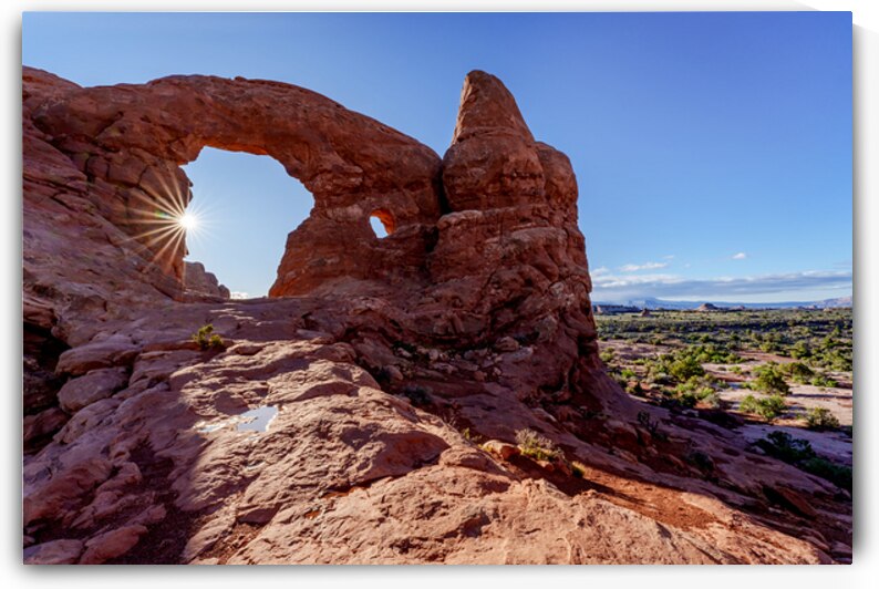 Morning Sun Star At Turret Arch by Jennifer White