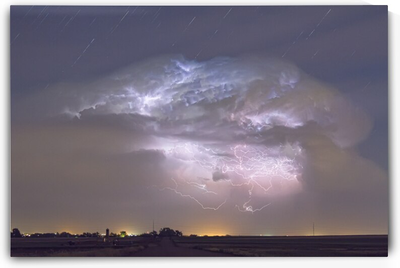 Cumulo nimbus Lightning Storm and Star Trails Above by Bo Insogna