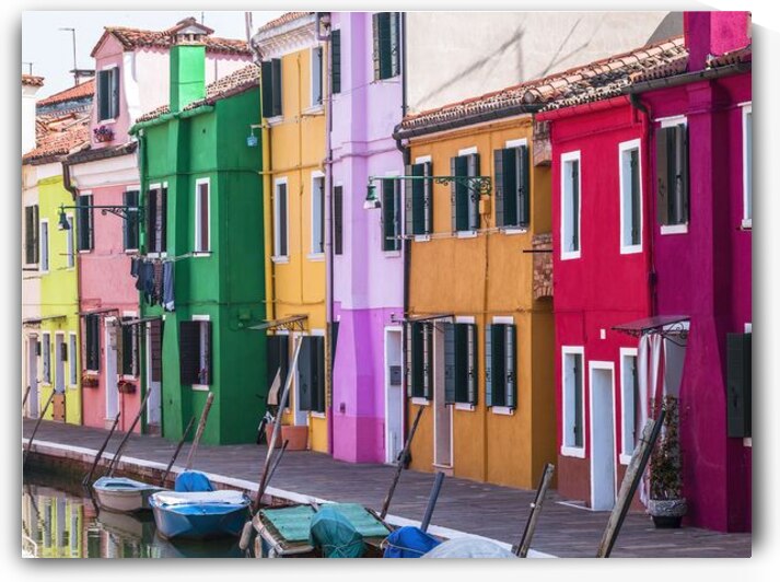 Multi Coloured houses next to a canal Burano Italy by Assaf Frank