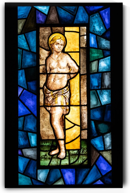 Stained glass window in Milan Cathedral by Paolo Modena