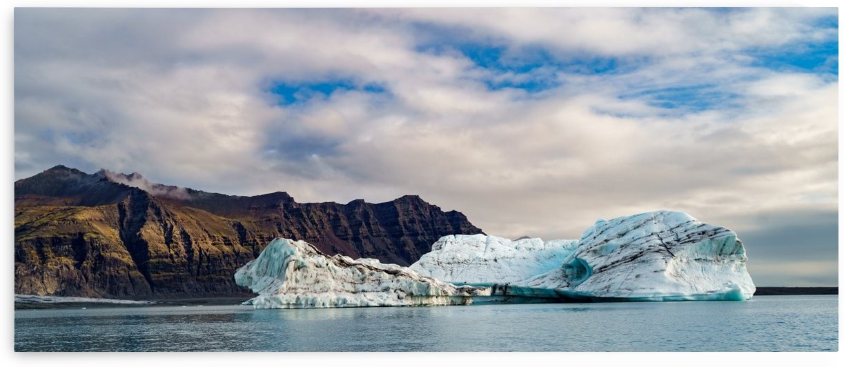 Cinematic View of the Glacier under the blue sky -- Jokulsarlon Iceland by Jason Wen Bin TONG 
