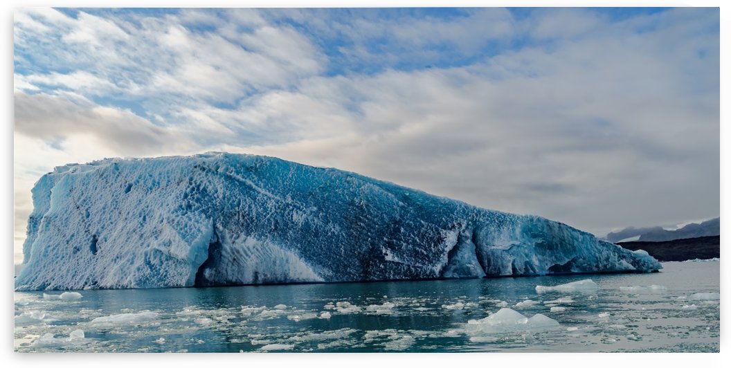  Isolated Iceberg under the gloomy sky -- Jokulsarlon Iceland by Jason Wen Bin TONG 