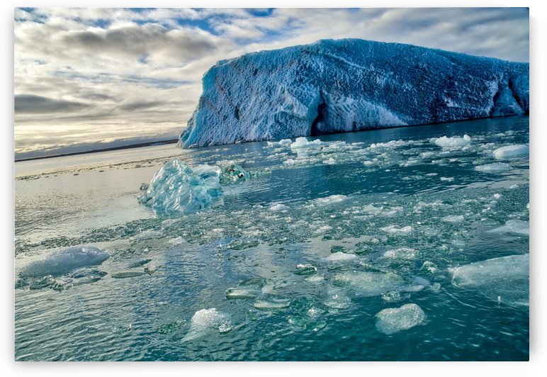 Melting crushed ice breaking off from isolated iceberg -- Jokulsarlon Iceland by Jason Wen Bin TONG 
