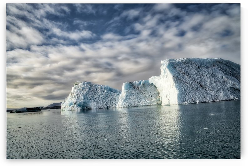 Isolated Iceberg under the dramatic blue sky -- Jokulsarlon Iceland by Jason Wen Bin TONG 