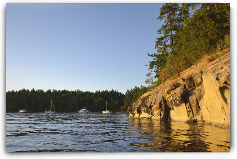 Sculpted sandstone cliff in front of the Tent Island anchorage by Kevin Oke