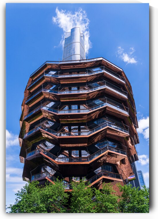 Reflective surface of the Vessel with a skyscraper behind with c by Steve Heap