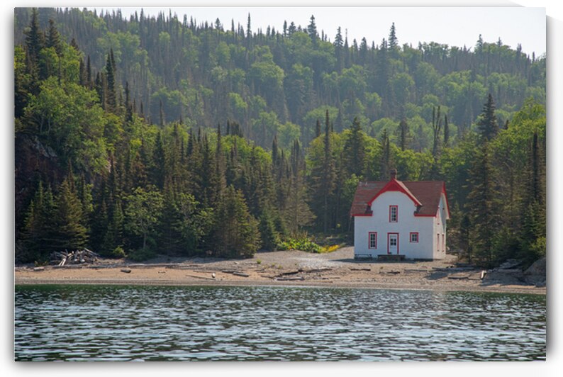 Slate Island lighthouse Keeper house Print by Stephen Emms