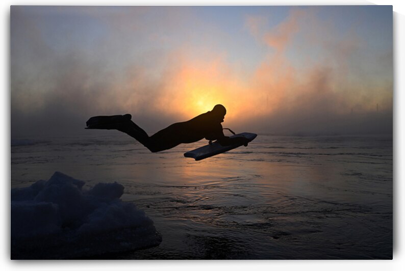 Winter surf by Bernard Brault