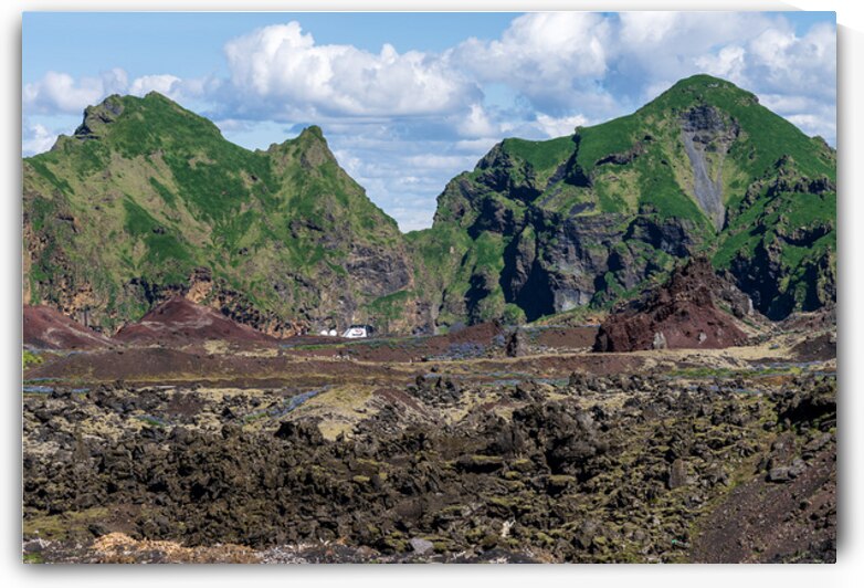 View from volcanic summit of Eldfell with Viking Neptune cruise by Steve Heap