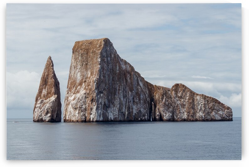 Kicker Rock or roca leon dormido sticking out of the ocean San Cristobal Galapagos by Ad Gr