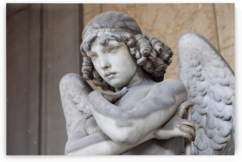 Cemetery statue of sad angel expressing solitude by Paolo Modena