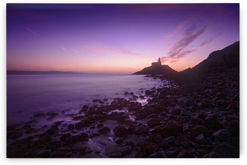Daybreak at Mumbles lighthouse by Leighton Collins