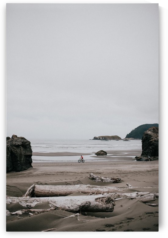 Cyclist on the beach by StephanieAllard
