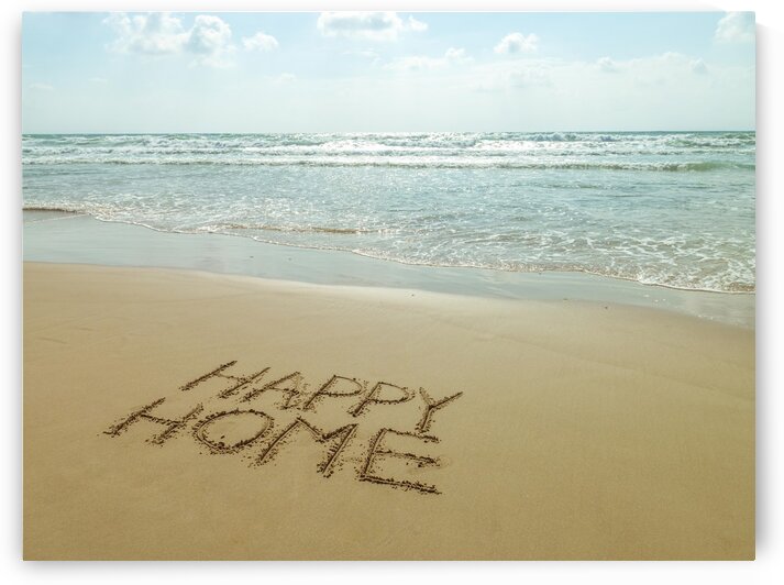 Happy Home written in sand on the beach by Assaf Frank
