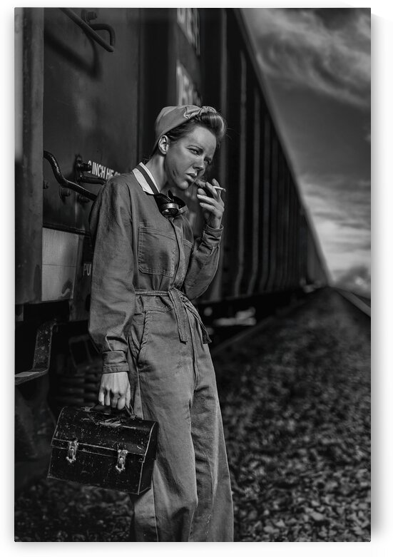 Vintage dirty female worker having her cigarette break leaning against a train wagon by Artmood Visualz