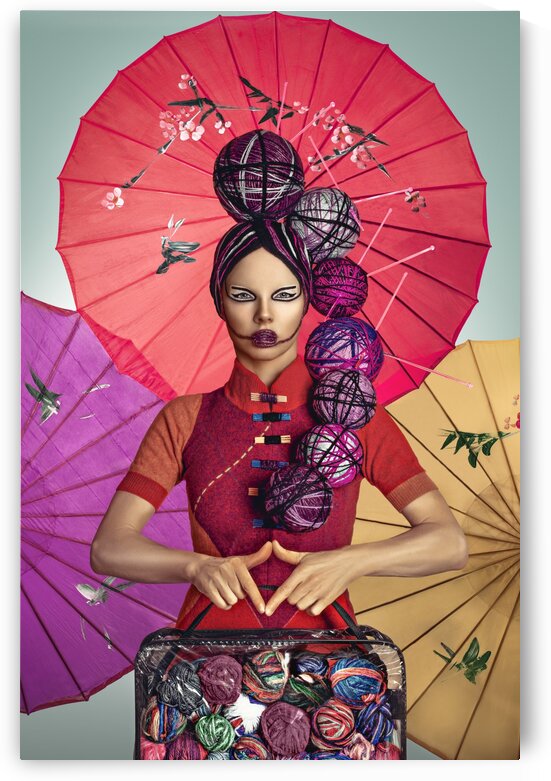 Portrait of an Asian woman with wool hair and wool makeup holding a bag of wool balls in front of colorful handcrafted chinese umbrellas by Artmood Visualz