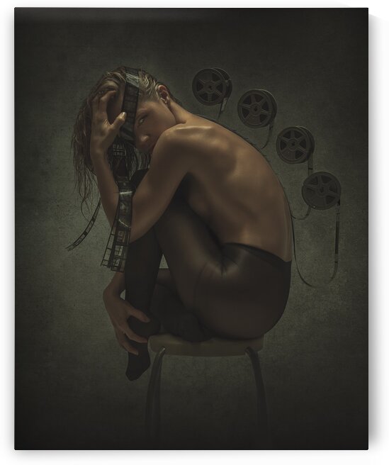 Young blonde woman with wet hair wearing black nylons and curled up on a stool fed by film reels upon her back and around her head in a dark atmosphere by Artmood Visualz